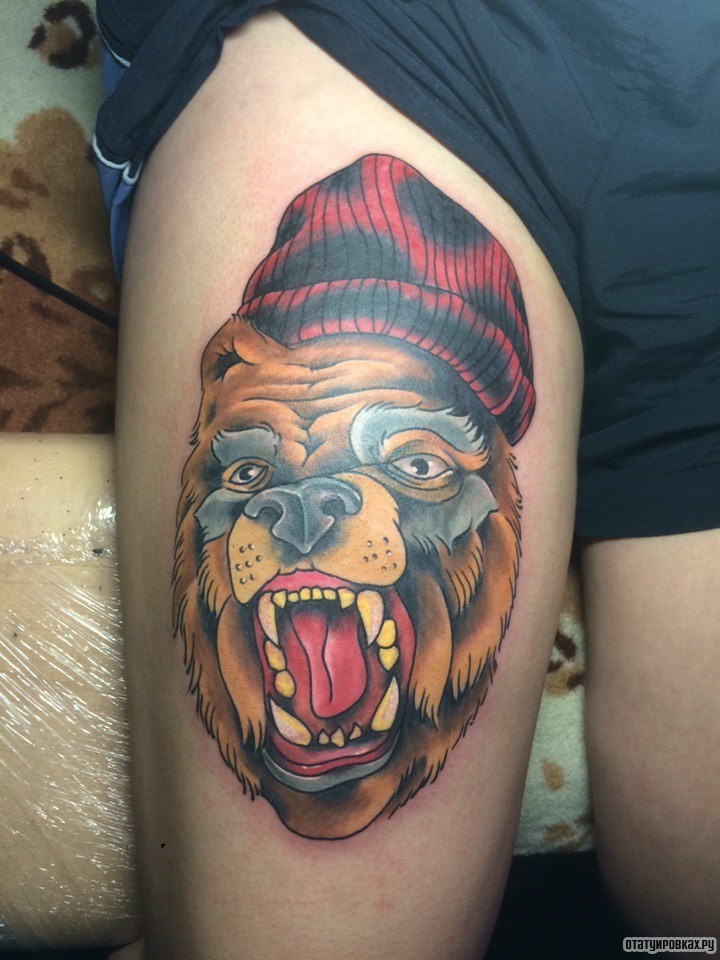 Фотография татуировки под названием «Медведь оскал в шапке»
