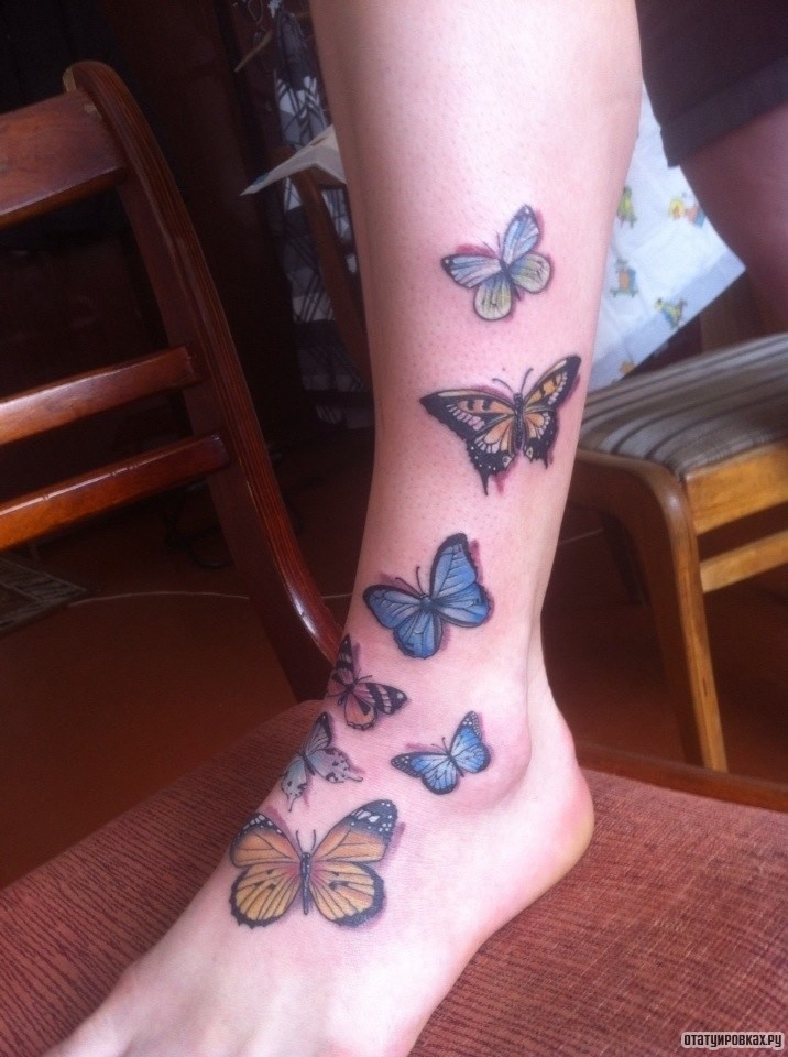 Фотография татуировки под названием «Бабочки»