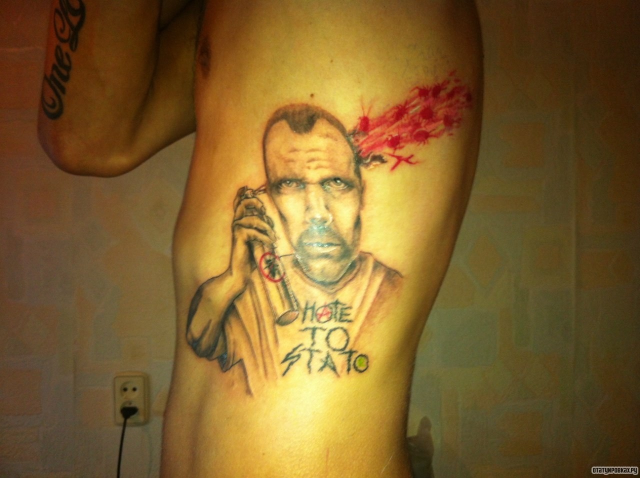 Фотография татуировки под названием «Человек с балончиком»
