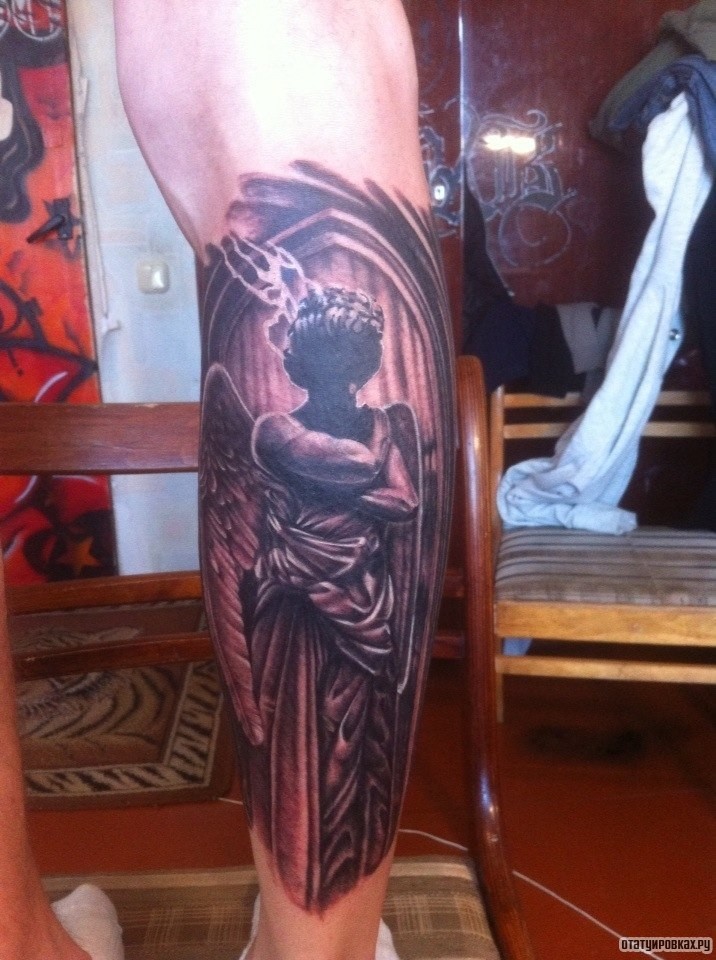 Фотография татуировки под названием «Ангел с тенями»