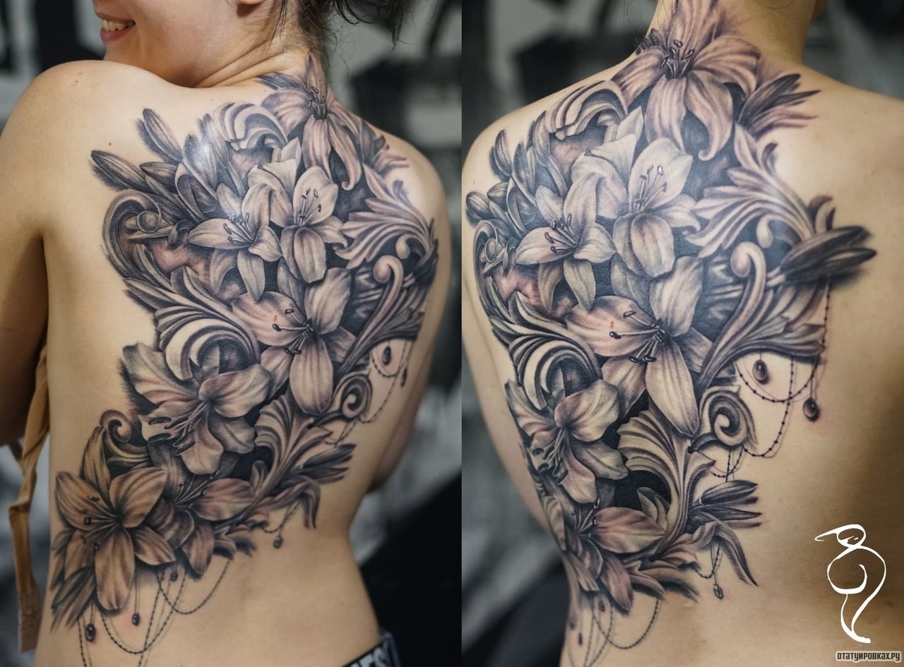 Фотография татуировки под названием «Лилии узор большой на спине»