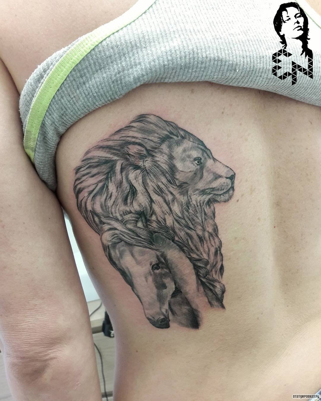 Фотография татуировки под названием «Лев и конь»