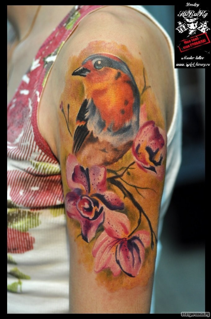 Фотография татуировки под названием «Птица на ветке сакуры»
