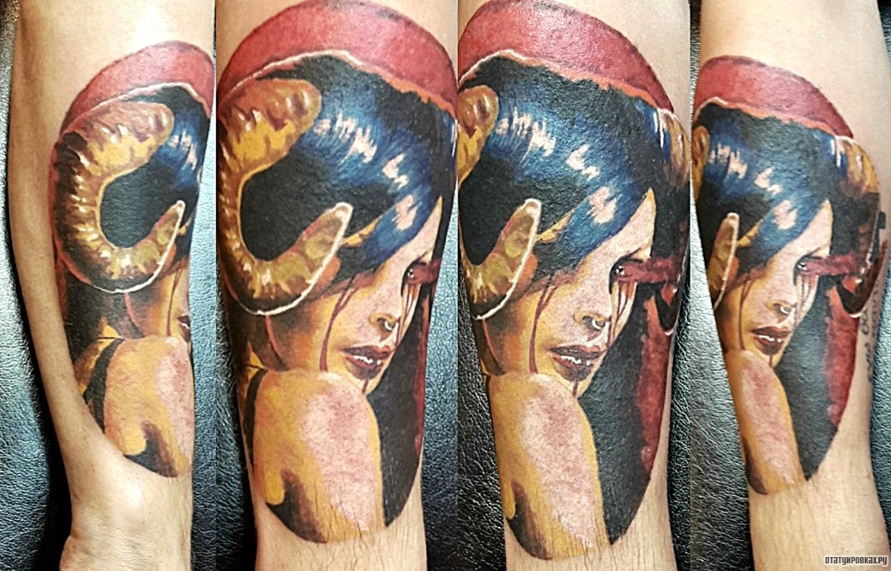 Фотография татуировки под названием «Девушка с рогами»