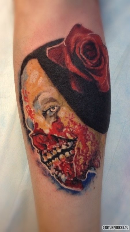Фотография татуировки под названием «Девушка с розой без лица»