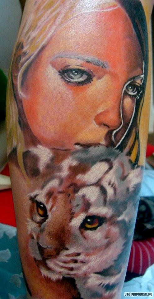 Фотография татуировки под названием «Девушка и тигренок»