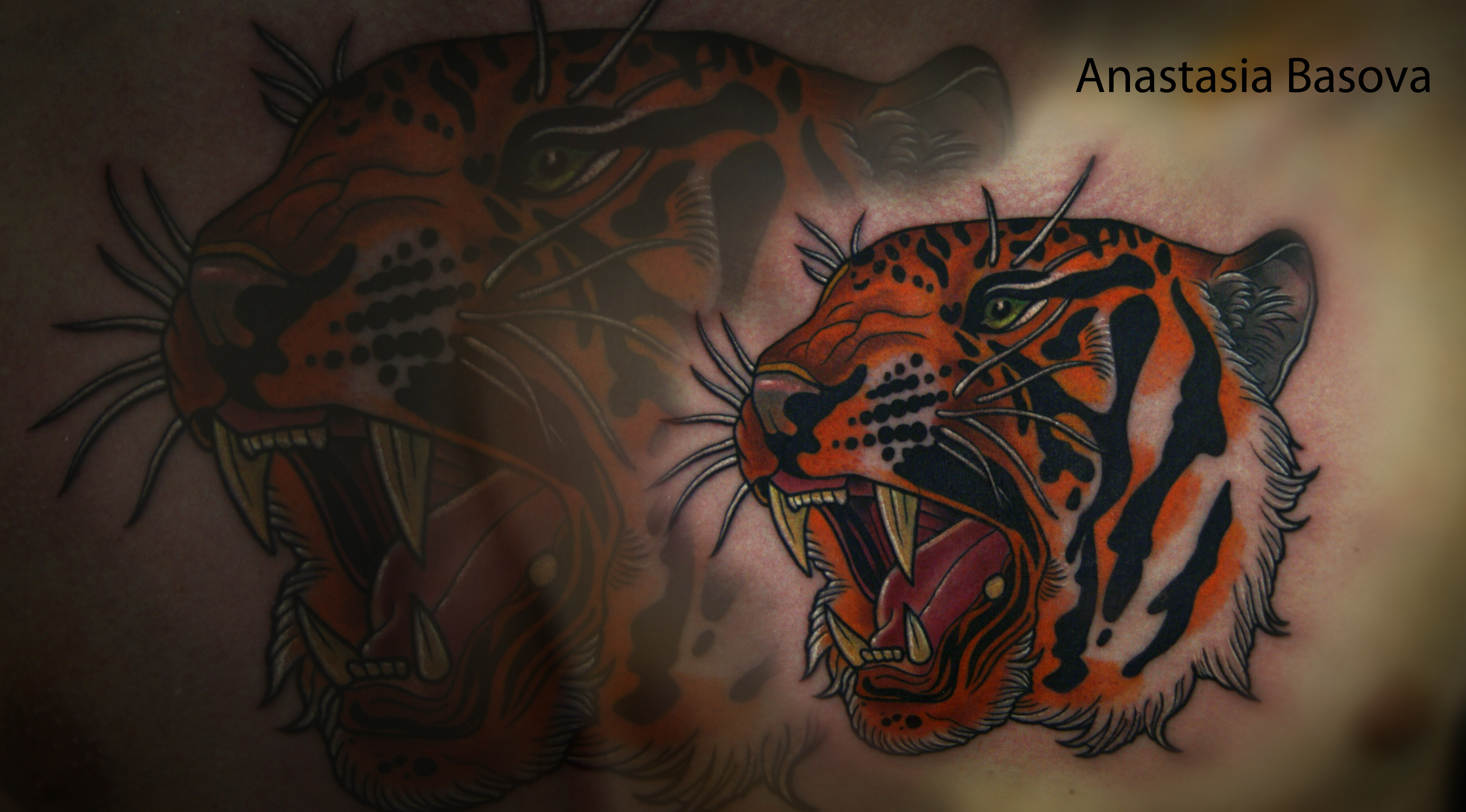 Фотография татуировки под названием «тигр»