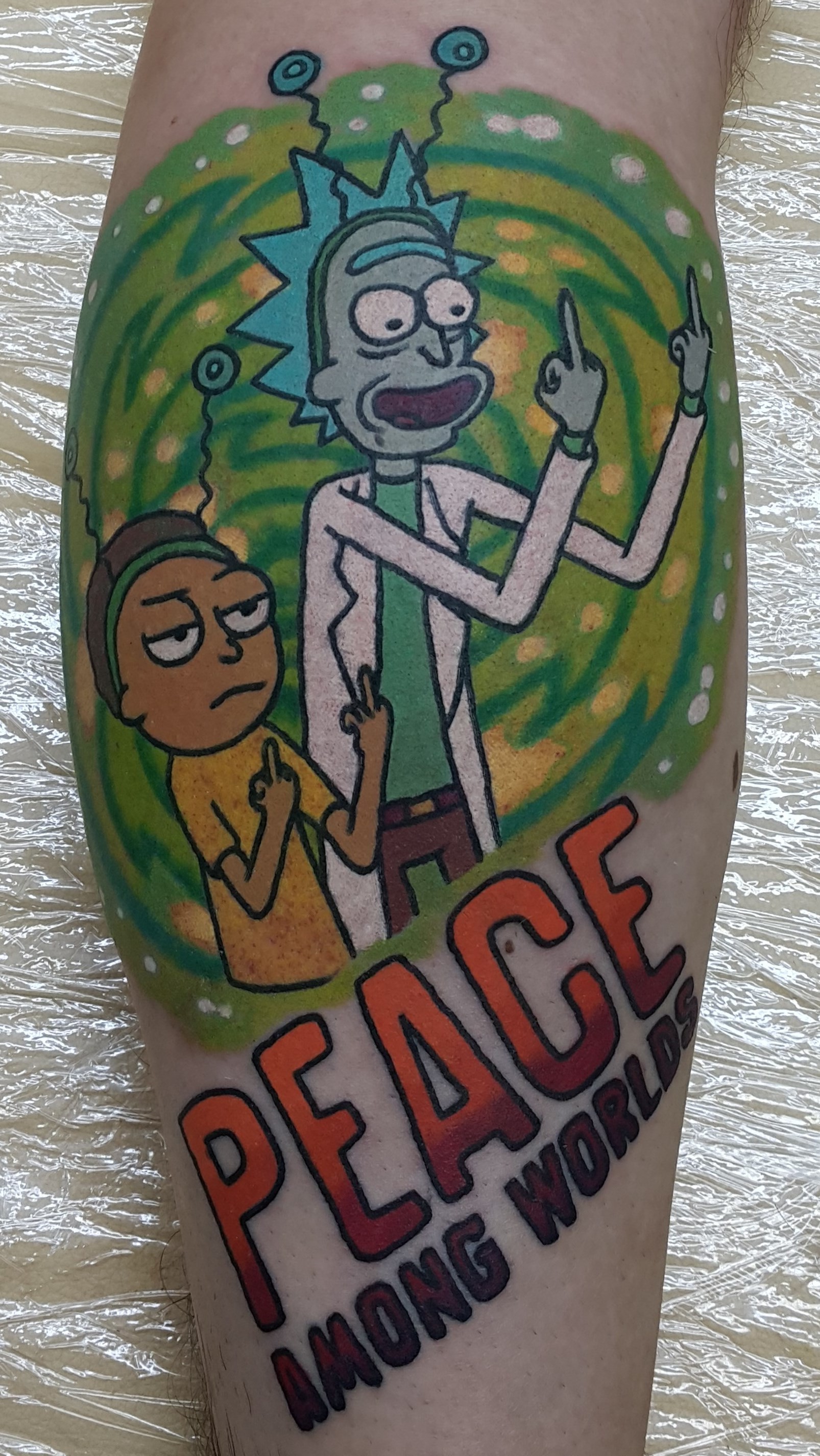 Фотография татуировки под названием «Rick-and-Morty»