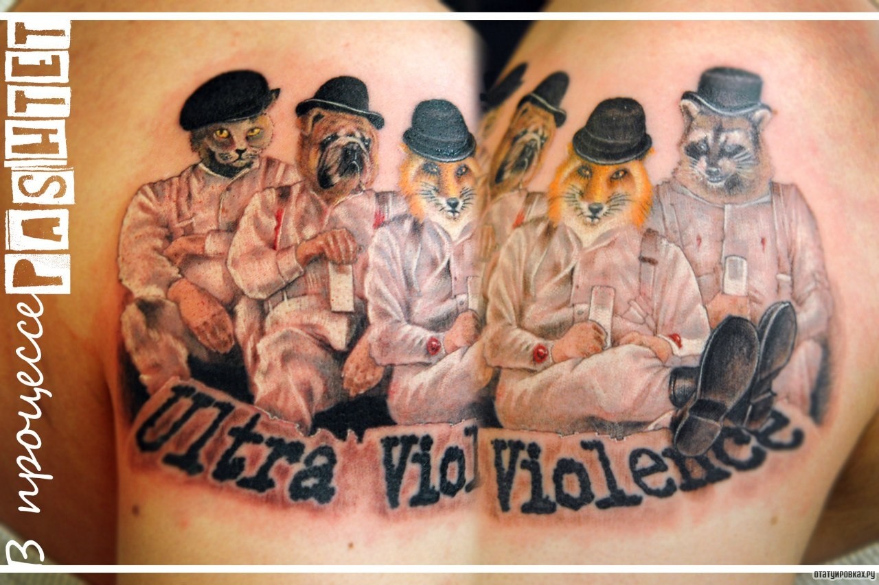 Фотография татуировки под названием «Животные в одежде»