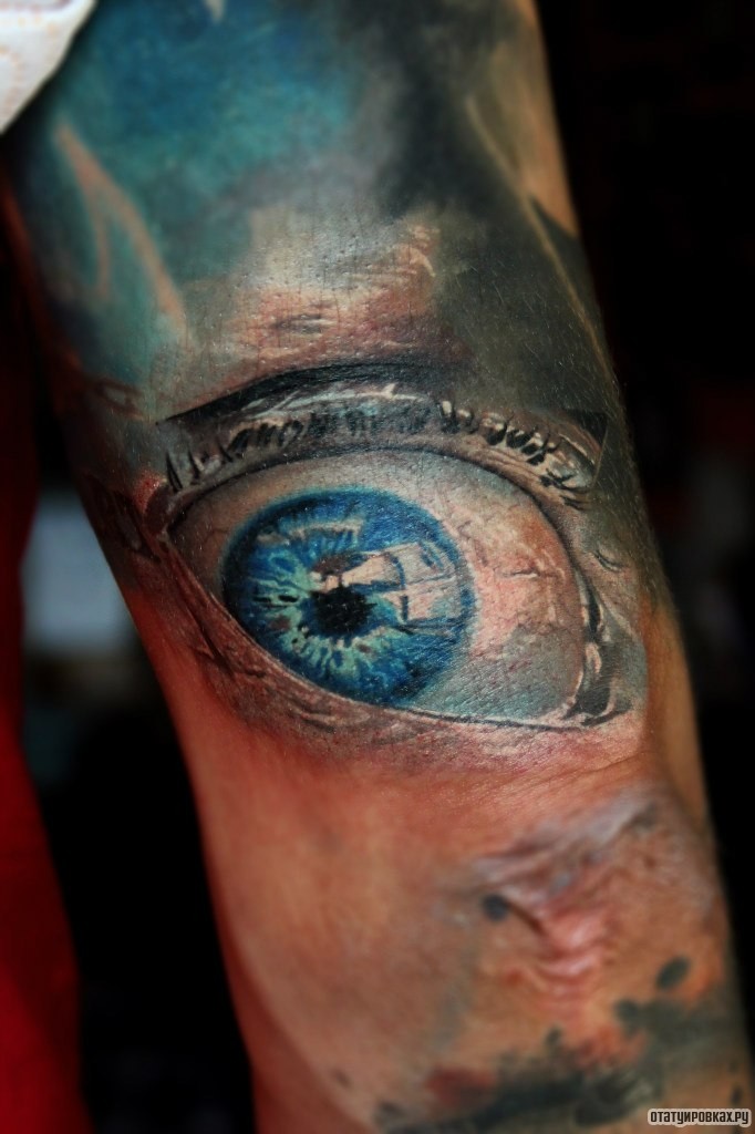 Фотография татуировки под названием «Голубой глаз»