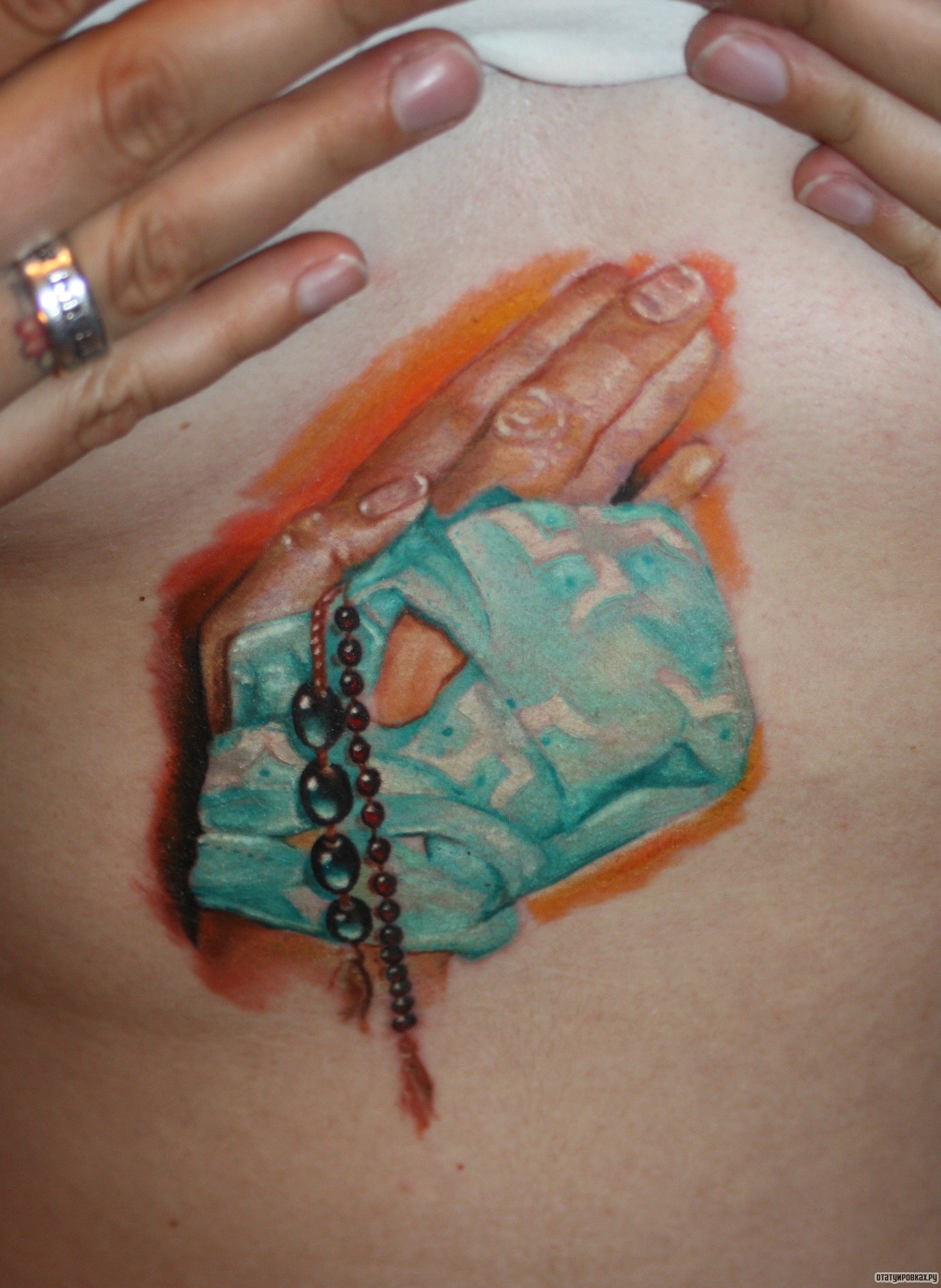 Фотография татуировки под названием «Перевязанная рука»