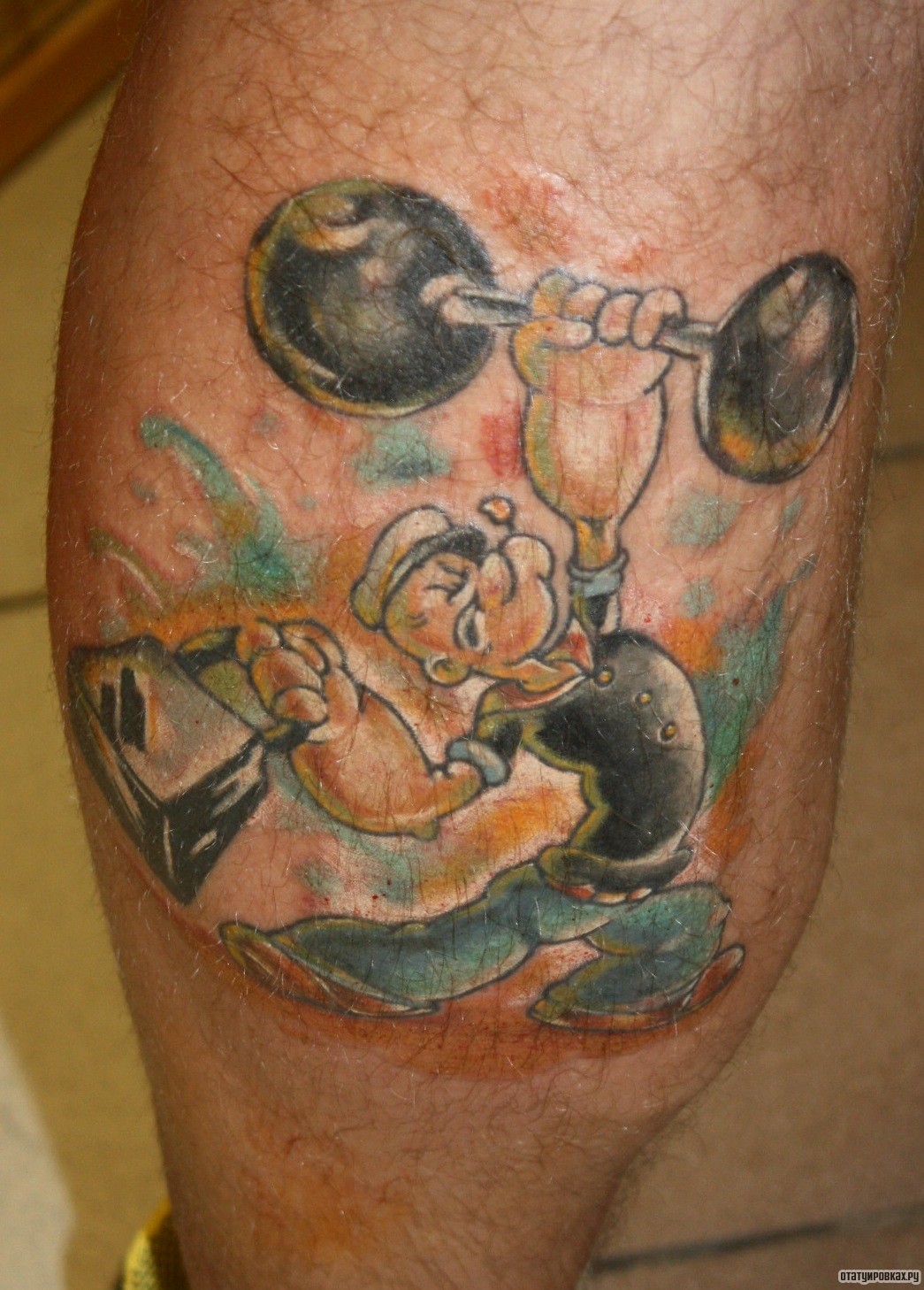 Фотография татуировки под названием «Мультяшный силач»