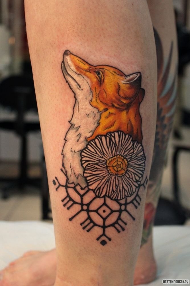 Фотография татуировки под названием «Лиса и цветок»