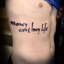 Тату money cant buy life