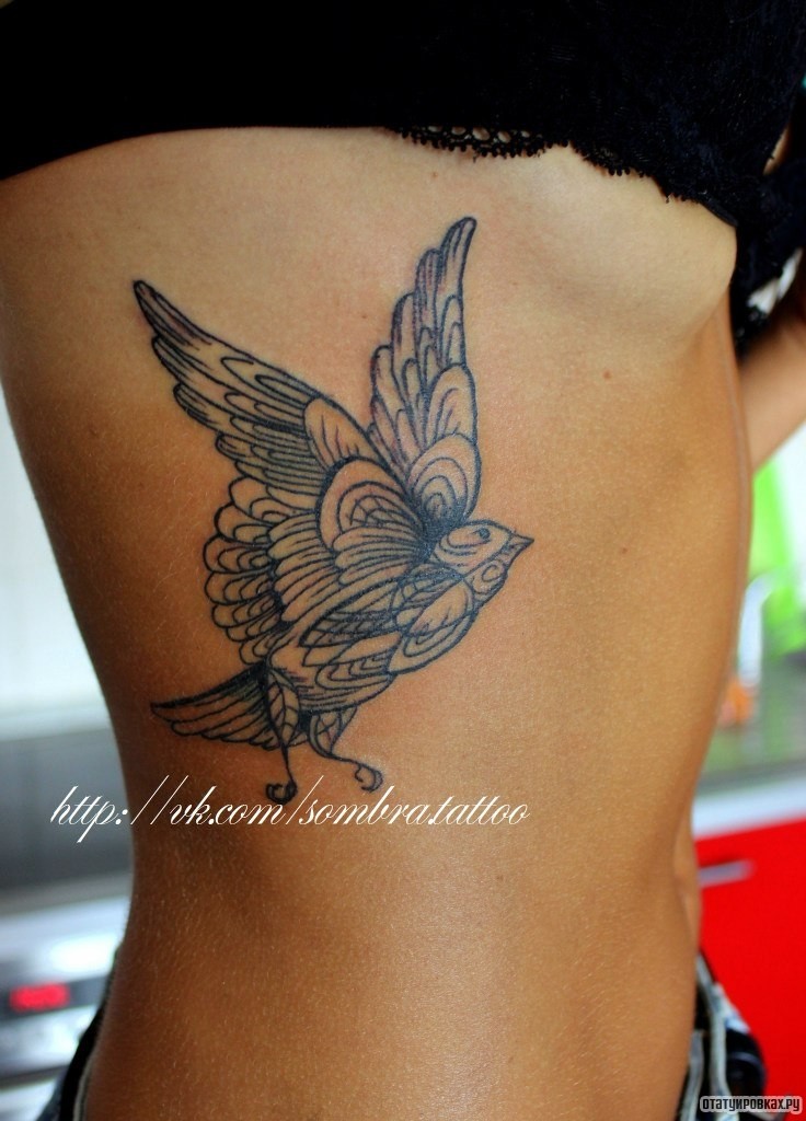 Фотография татуировки под названием «Птичка узор»