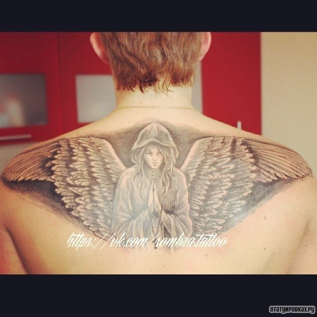 Фотография татуировки под названием «Ангел девушка с плаще»