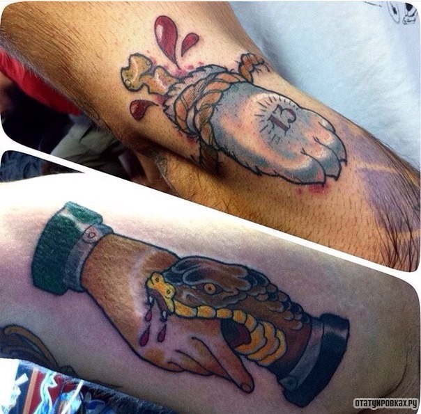 Фотография татуировки под названием «Змея кусает руку»