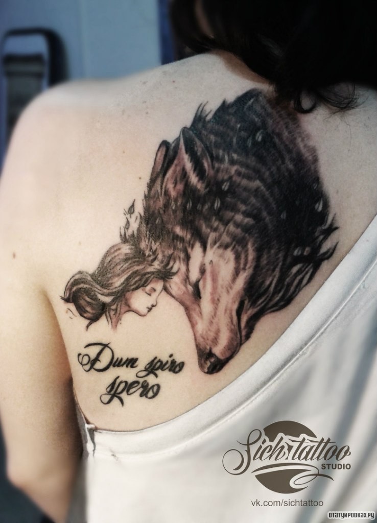 Фотография татуировки под названием «Волк и девочка»