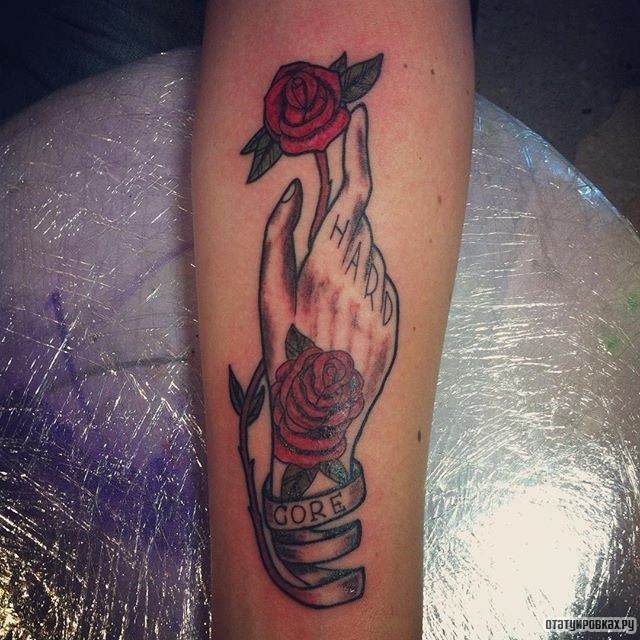 Фотография татуировки под названием «Рука с розой»