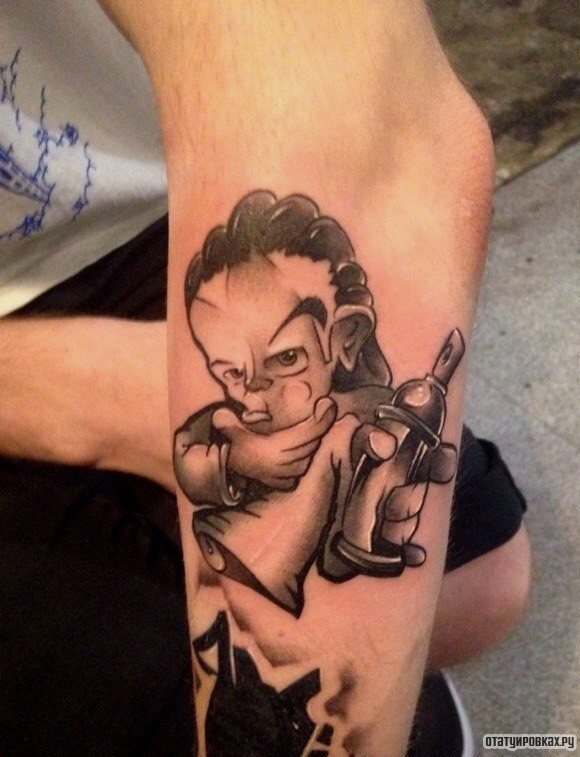 Фотография татуировки под названием «Человек и баллончик»