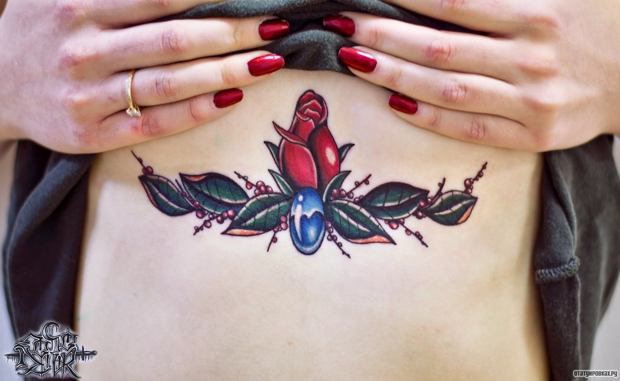 Фотография татуировки под названием «Роза с узорами»