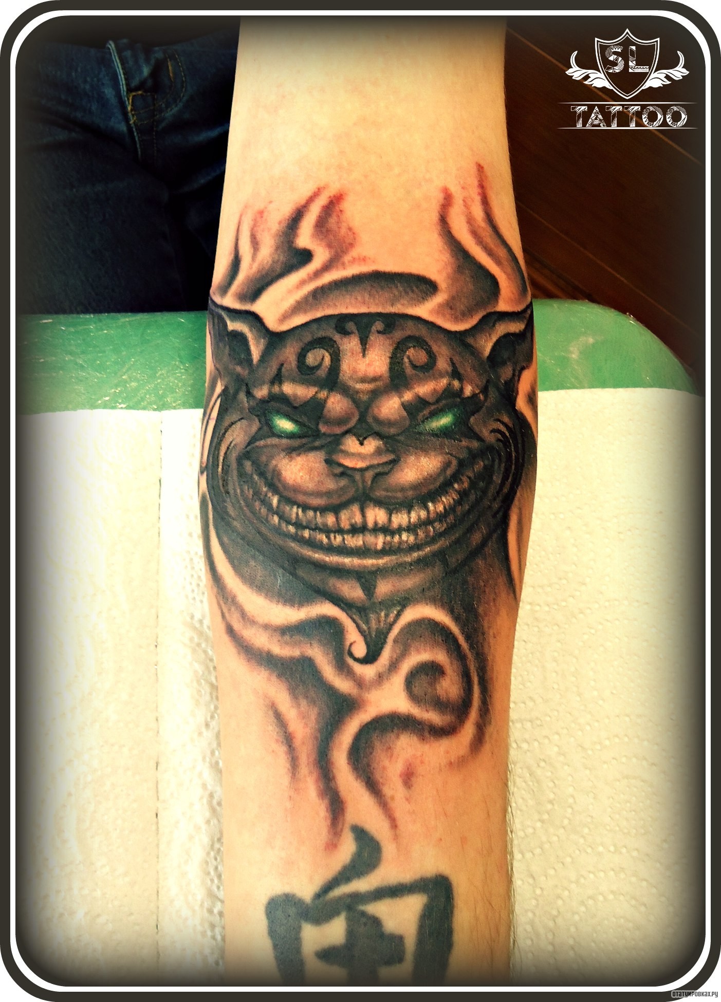 Фотография татуировки под названием «Злой чеширский кот»