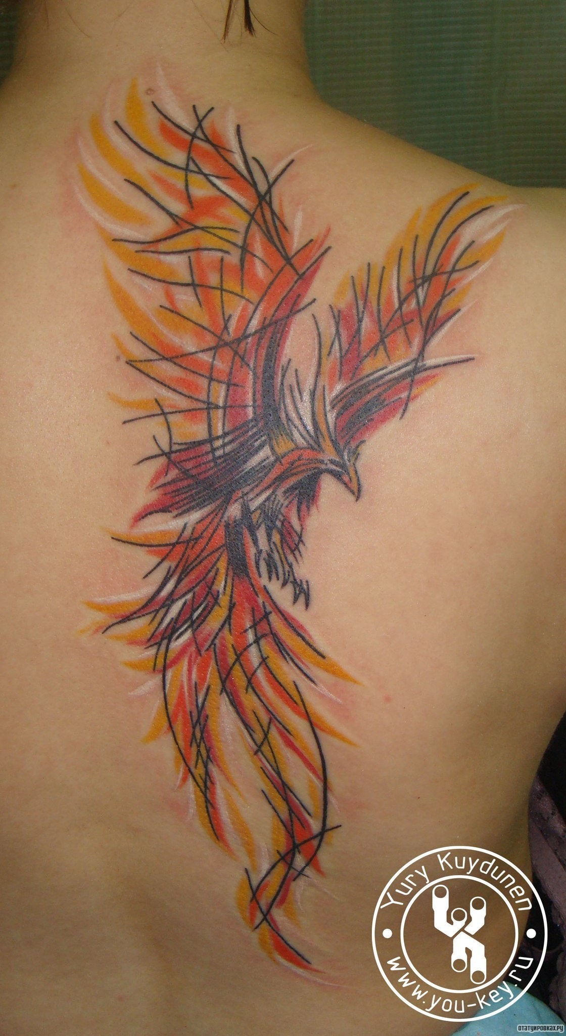 Фотография татуировки под названием «Жар птица в абстрактном варианте»