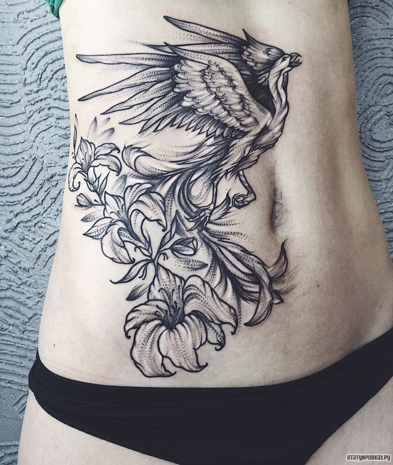 Фотография татуировки под названием «Жар птица с лилиями»