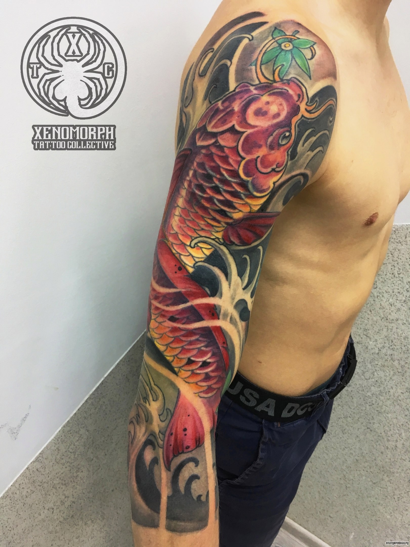 Фотография татуировки под названием «Карп в волнах японская тату»