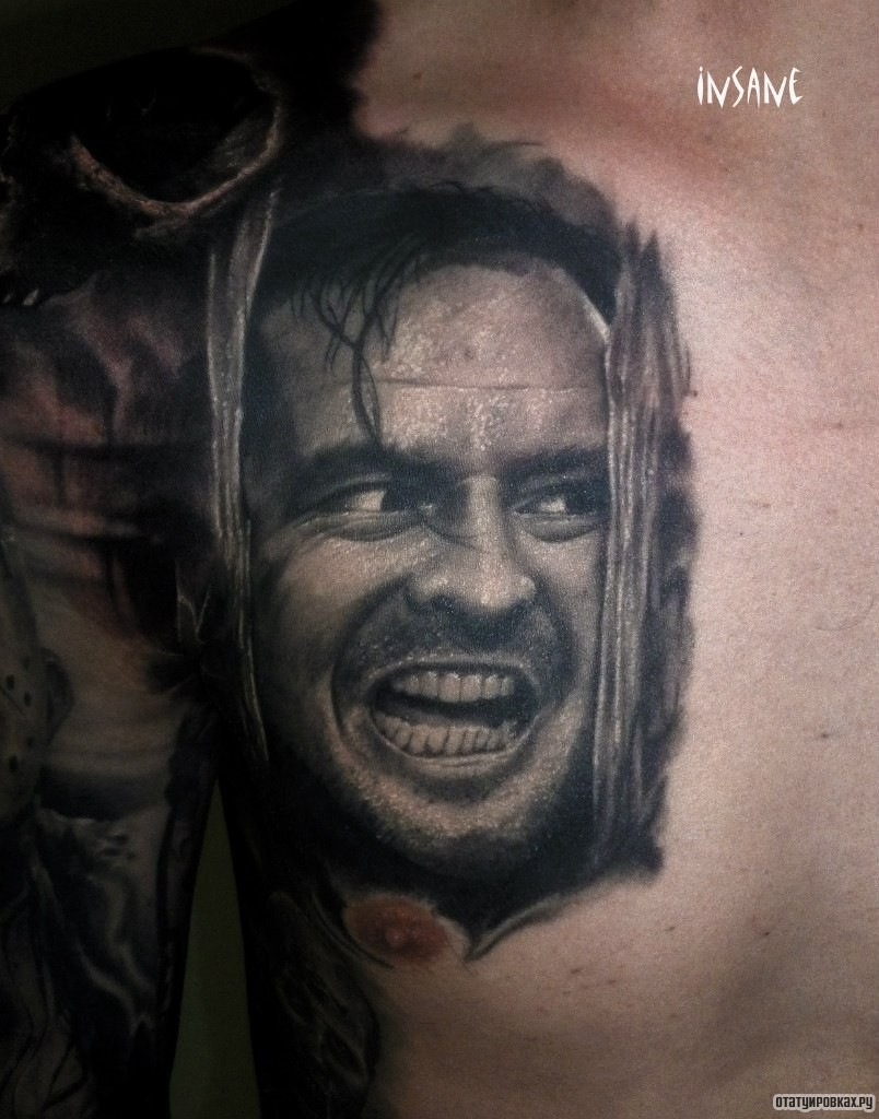 Фотография татуировки под названием «Лицо человека за решеткой»