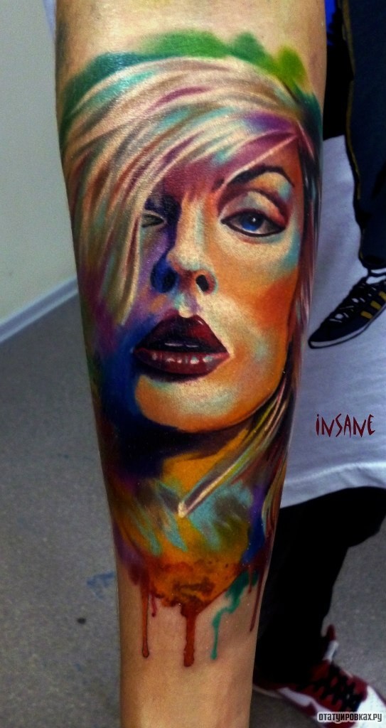 Фотография татуировки под названием «Лицо девушки в красках»