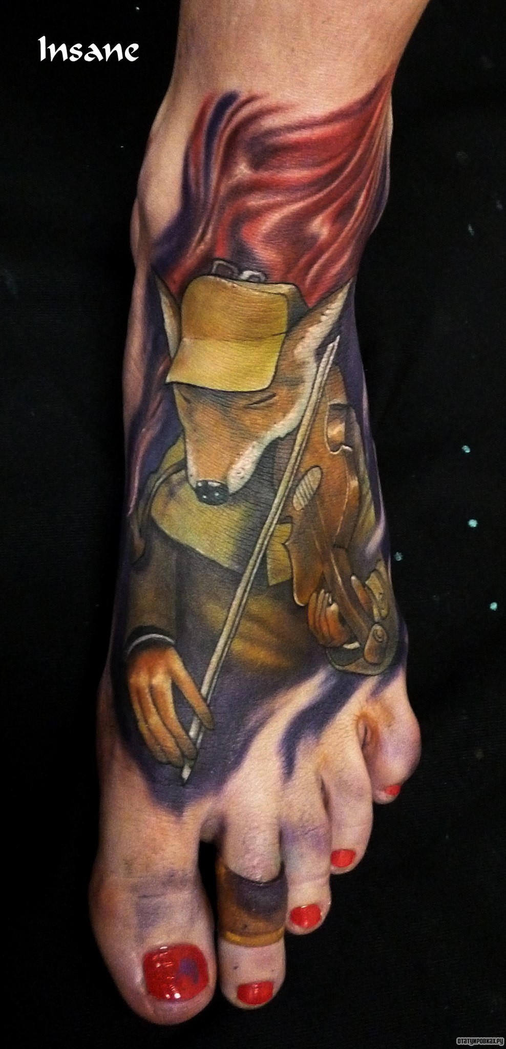 Фотография татуировки под названием «Мышь со скрипкой»