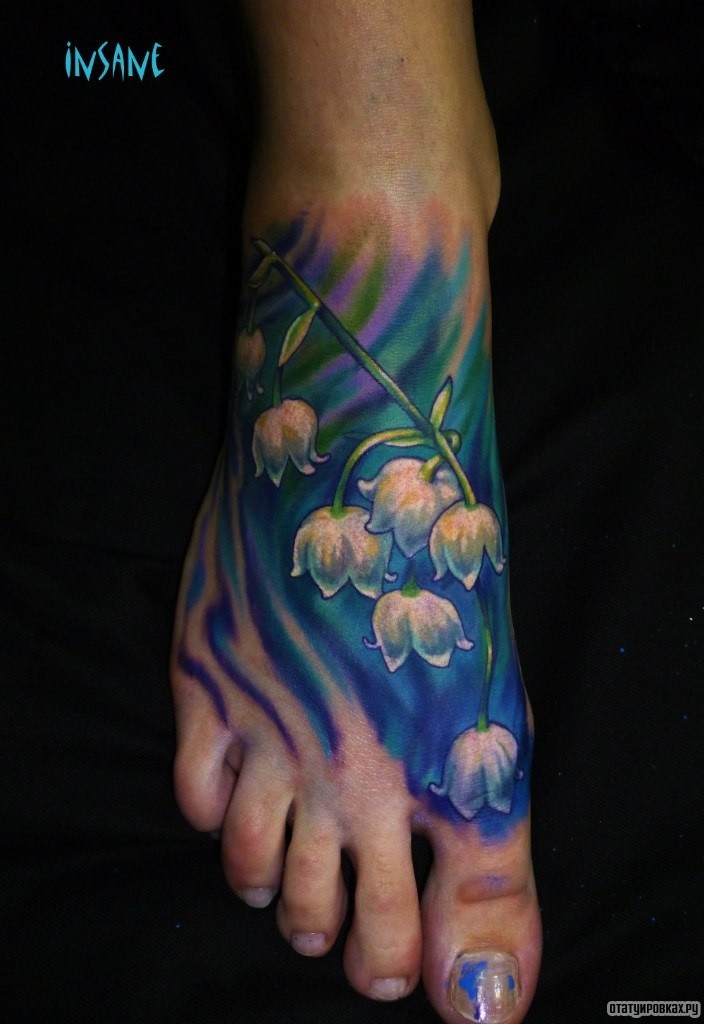 Фотография татуировки под названием «Цветок ландыша»
