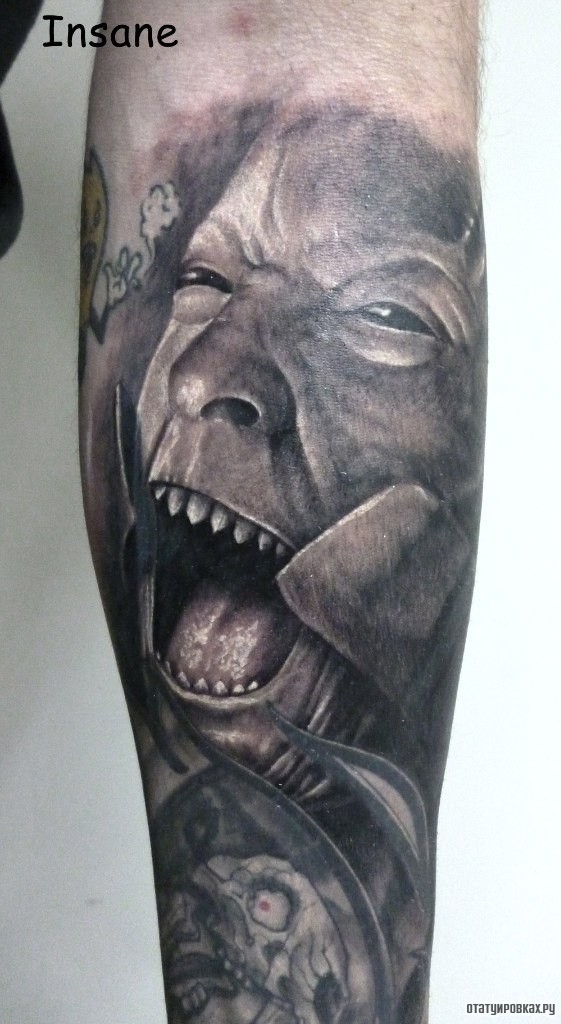 Фотография татуировки под названием «Человек орет»
