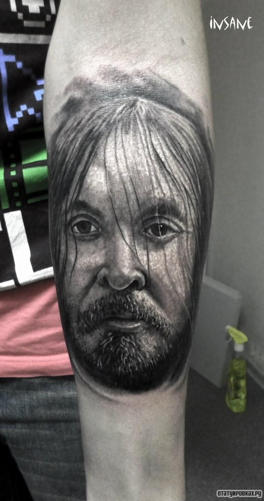 Фотография татуировки под названием «Лицо человека портрет»
