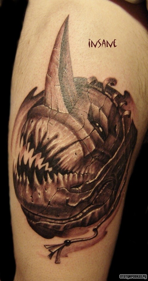 Фотография татуировки под названием «Чудовище с рогом»