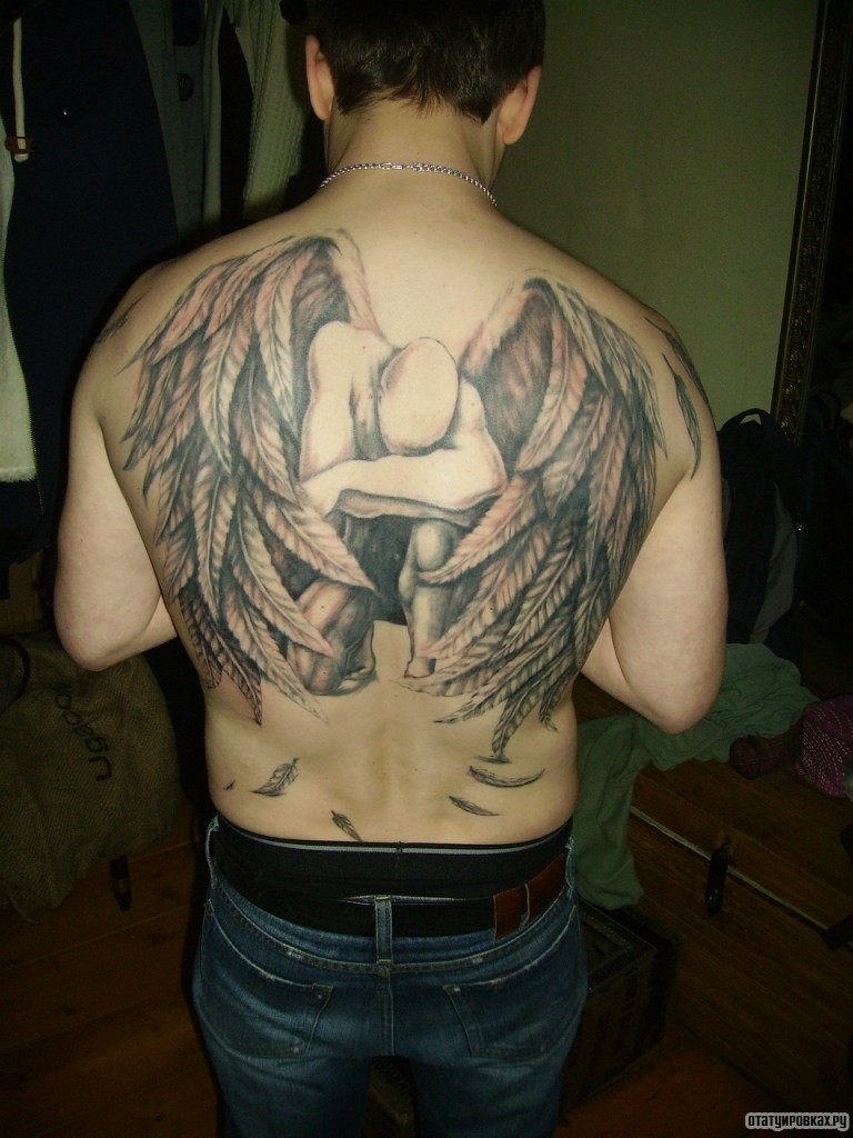Фотография татуировки под названием «Ангел с крыльями на спине»