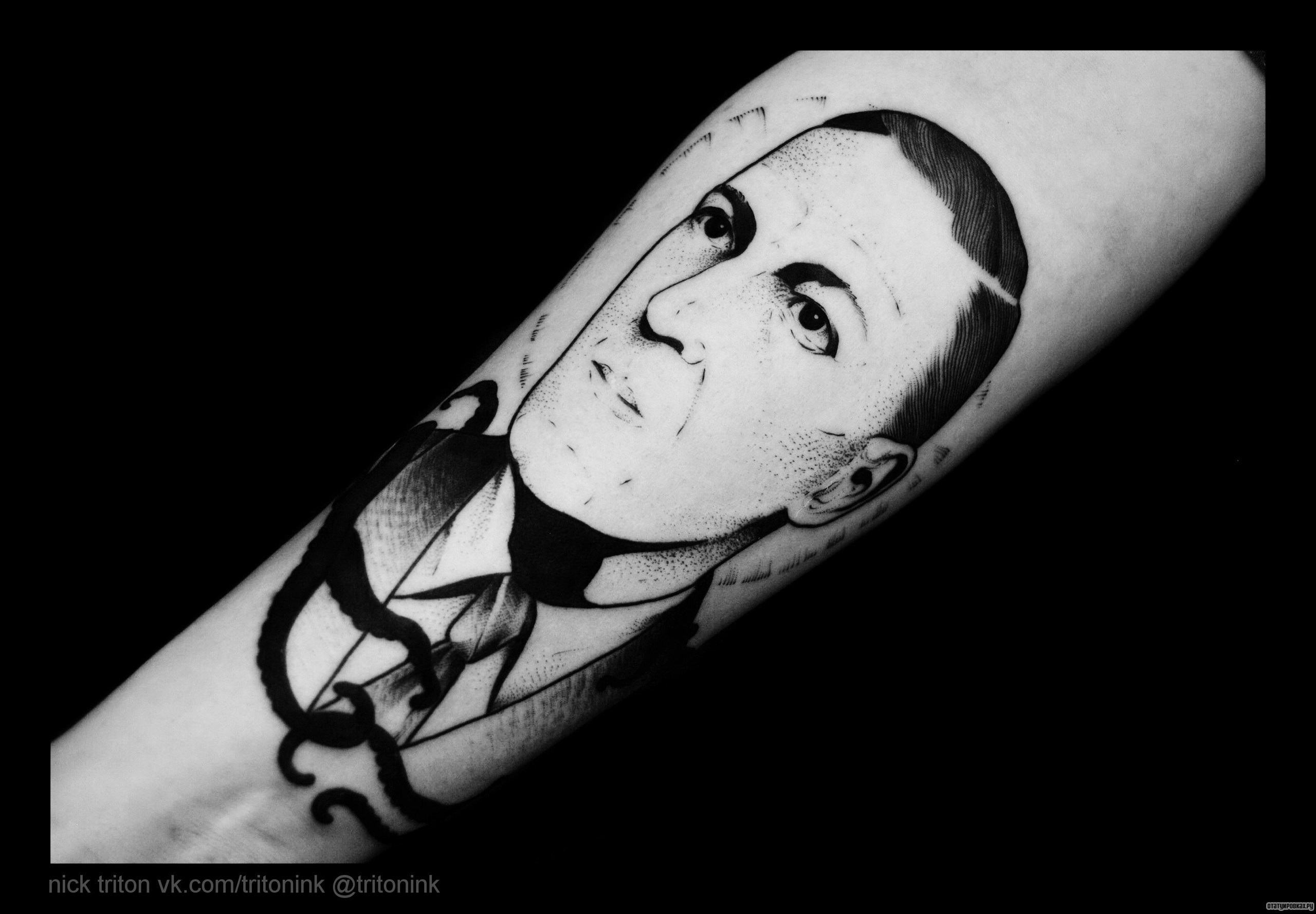 Фотография татуировки под названием «Человек»