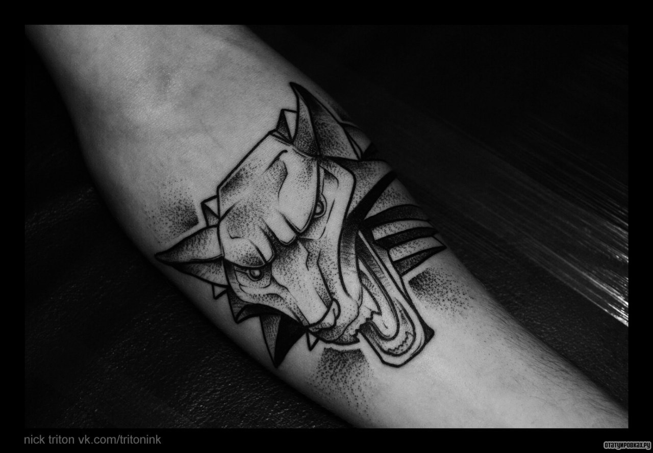 Фотография татуировки под названием «Оскал животного»