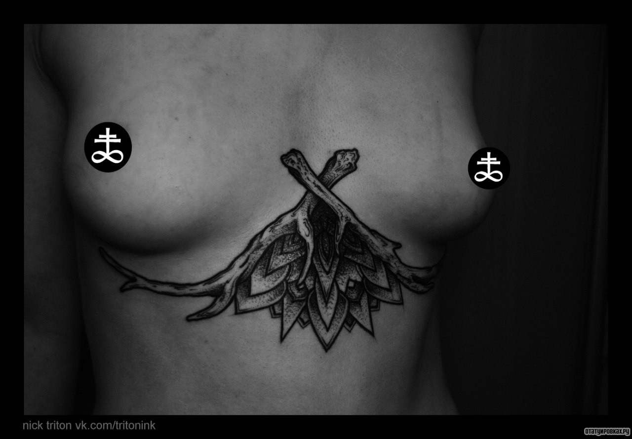 Фотография татуировки под названием «Узор с ветками дерева»