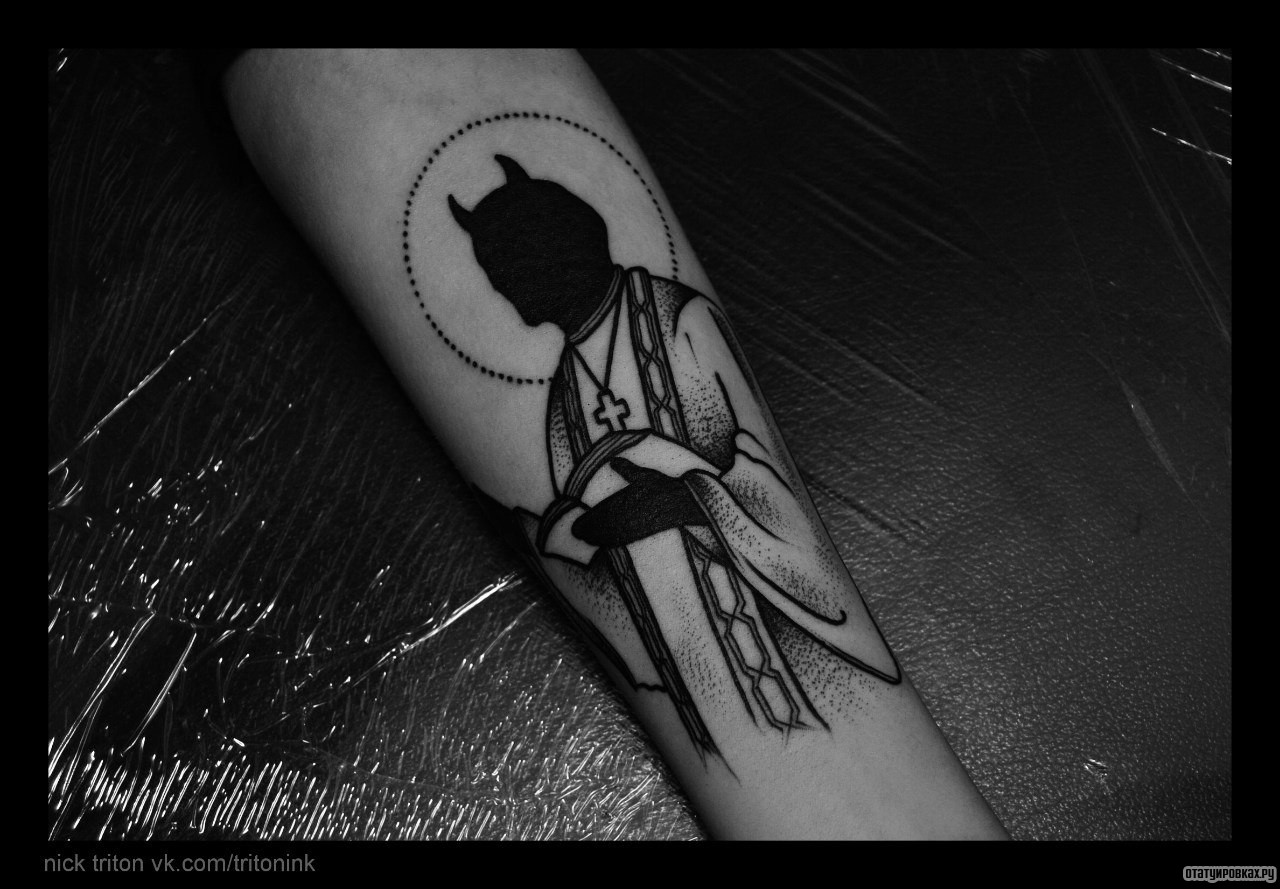 Фотография татуировки под названием «Святой дьявол»