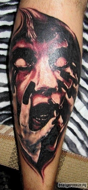 Фотография татуировки под названием «Жуткое лицо»