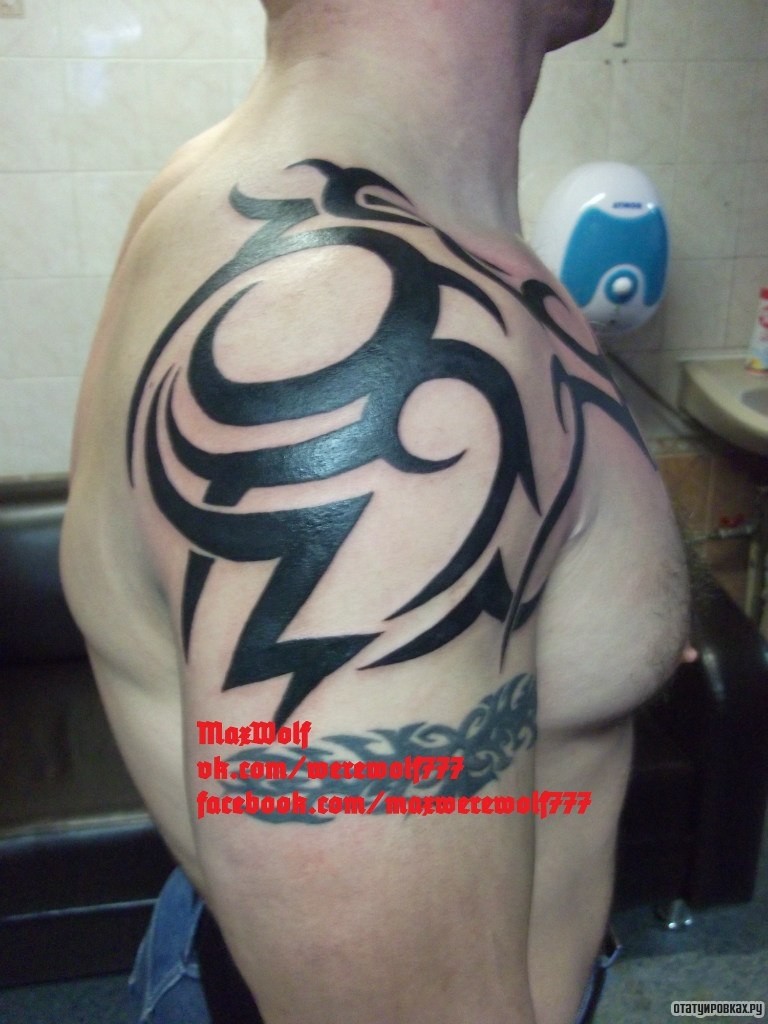 Фотография татуировки под названием «Узор трайбл»