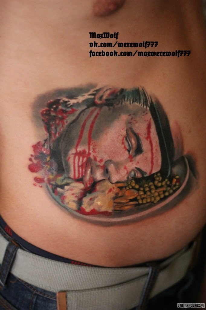 Фотография татуировки под названием «Отрезанна голова»