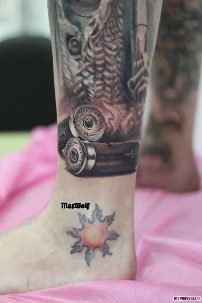 Фотография татуировки под названием «Гильзы от патронов»