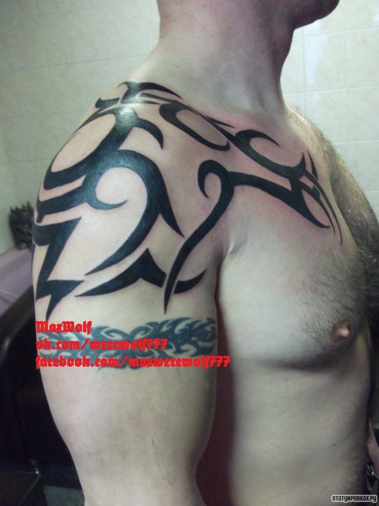 Фотография татуировки под названием «Трайбл узор у парня»