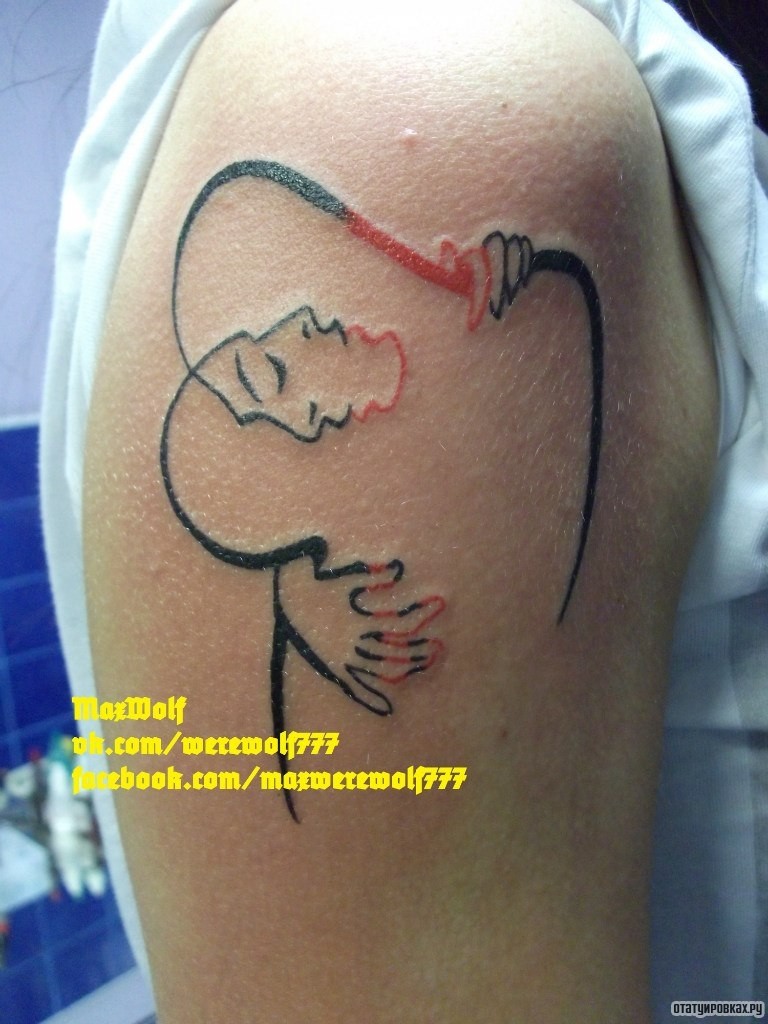 Фотография татуировки под названием «Два лица из линий»