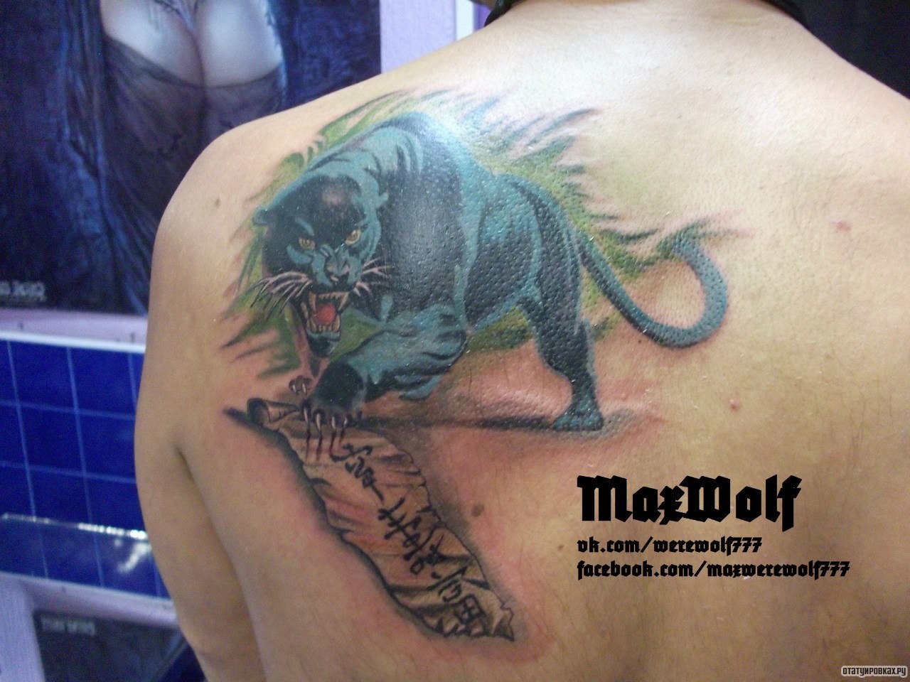 Фотография татуировки под названием «Черно-голубая пантера»