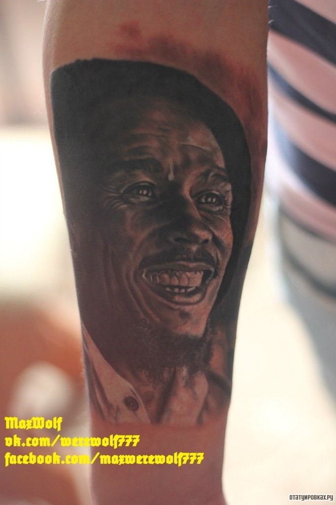 Фотография татуировки под названием «Портрет человека чернокожего»