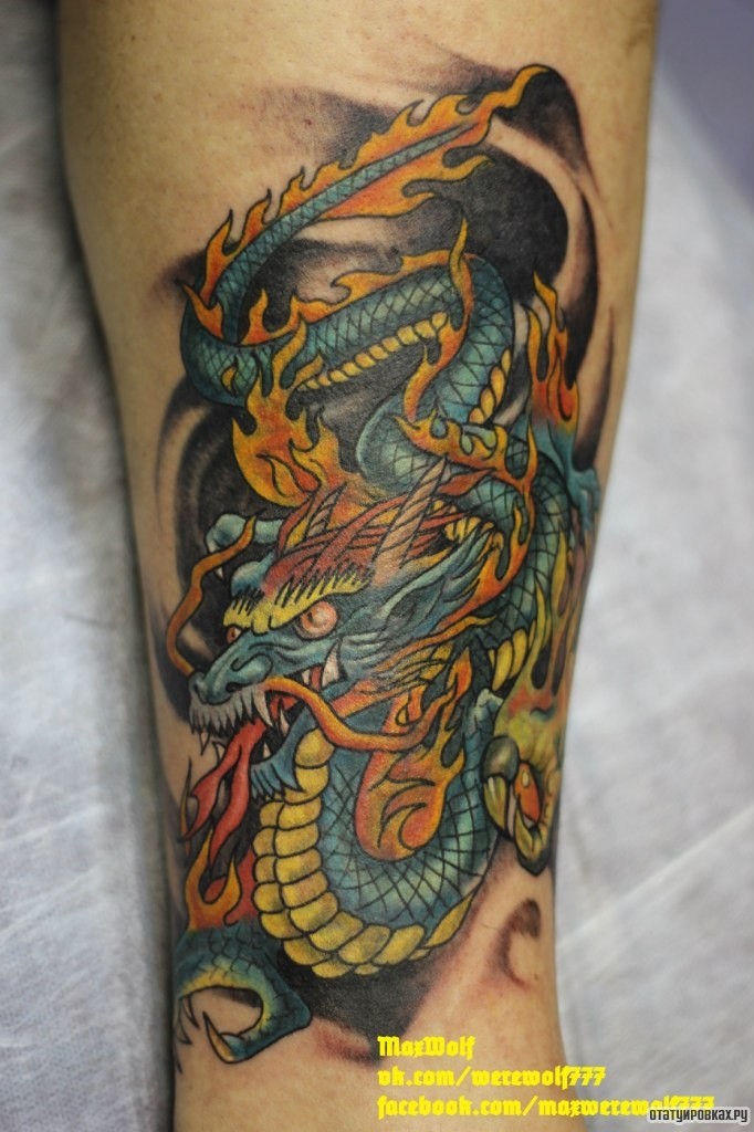 Фотография татуировки под названием «Дракон японский в огне»